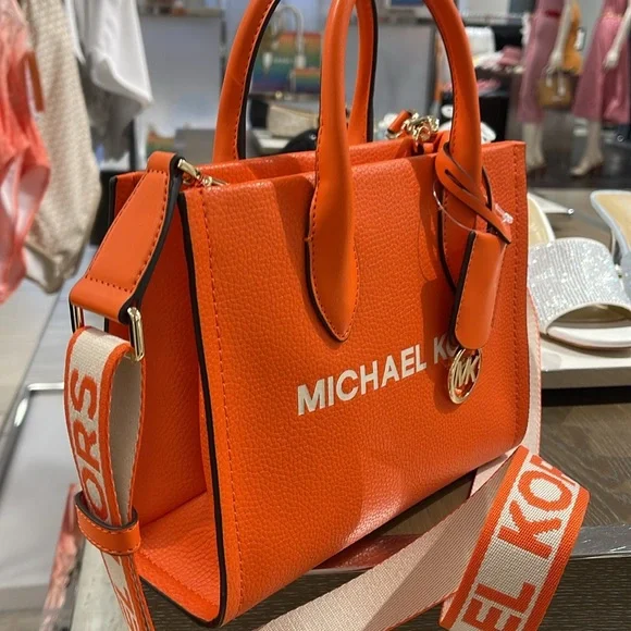 Michael Kors Mirella Small Pebbled Leather Shopper Top Zip Crossbody XBODY
Poppy - Picture 7 of 16